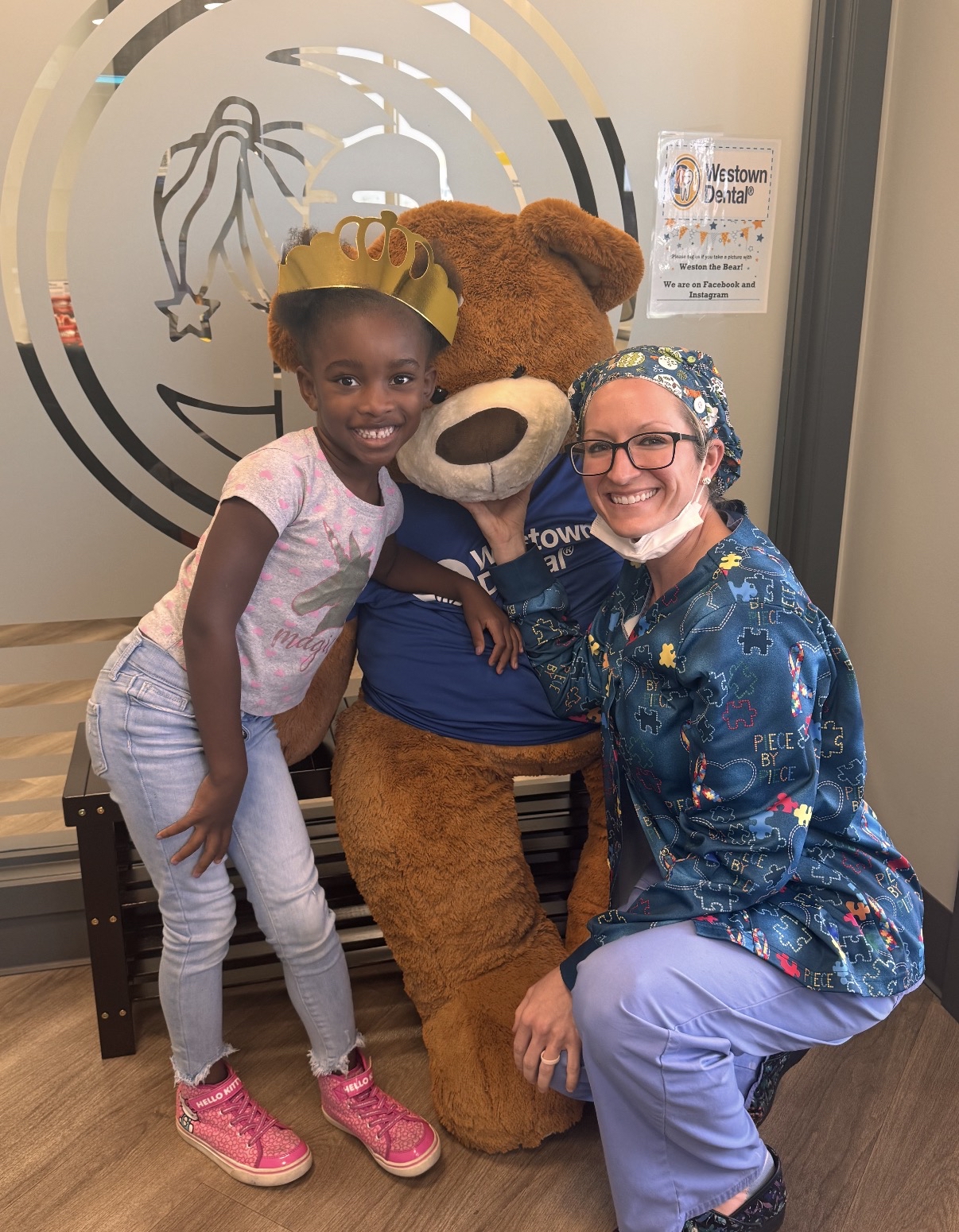 Dr. Morgan Morrow with a young patient at First Smile Pediatric Dentistry in Middletown, Delaware